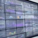 Market analysis dashboard with AI indicators and sentiment overlays for multiple asset classes